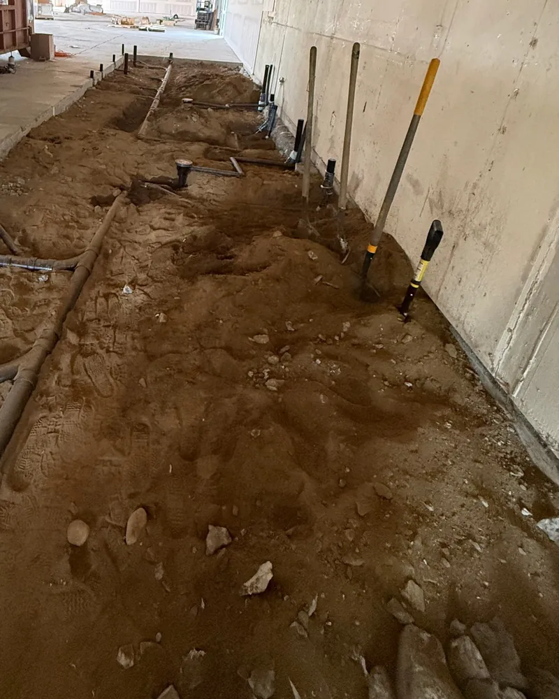 Underground drain lines set before the slab is poured